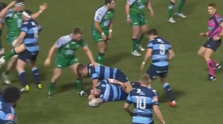 Alex Cuthbert knocks on out of the ruck into open play